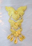 GOLD BROOCH IN BAT