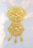 GOLD BROOCH IN OVAL